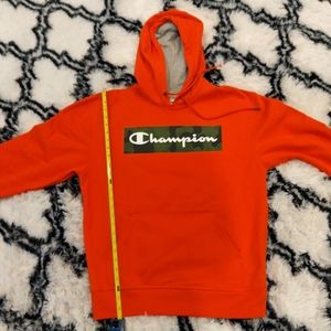 Champion bright orange with army logo in front.